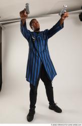 Garson STANDING POSE WITH GUNS 